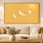 Golden Flight bird artwork in a warm living room