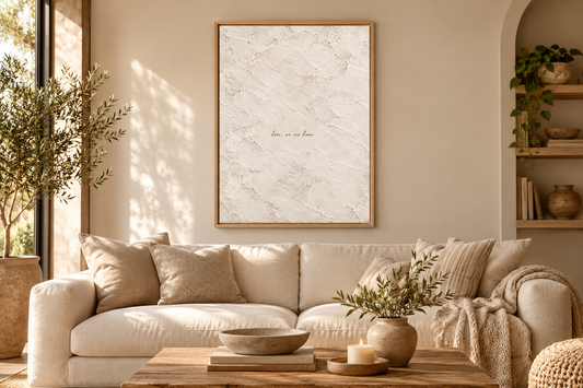 Here We Are Home quote art in a warm neutral living room
