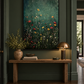 Dark green meadow artwork in a black frame in a hallway