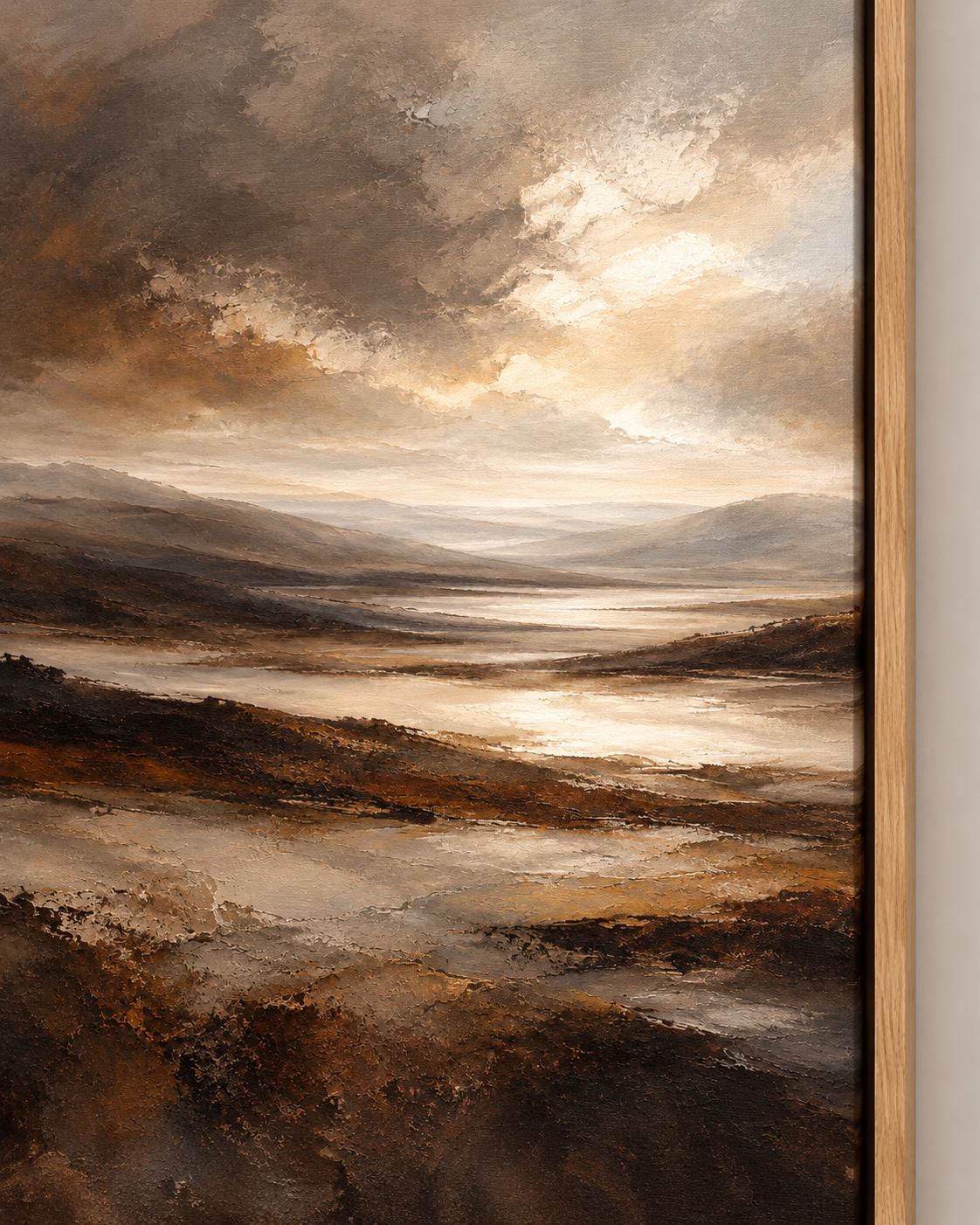 Close-up of brown landscape canvas in an oak float frame