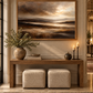 Moody brown landscape artwork above a hallway console