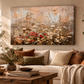 Wildflower floral canvas wall art displayed in a warm earthy living room with cream, rust and natural wood tones